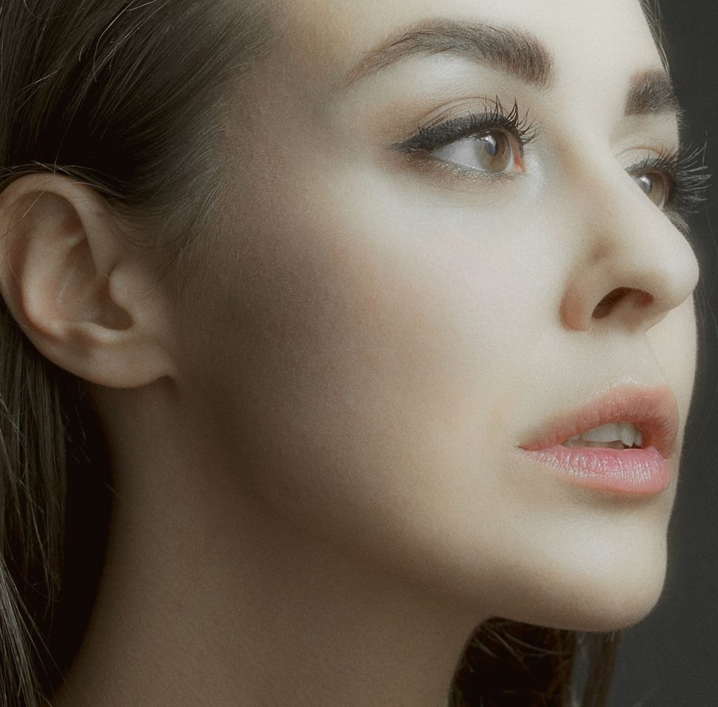 Artistic close-up of a woman's face creating an ethereal look in Kyiv.